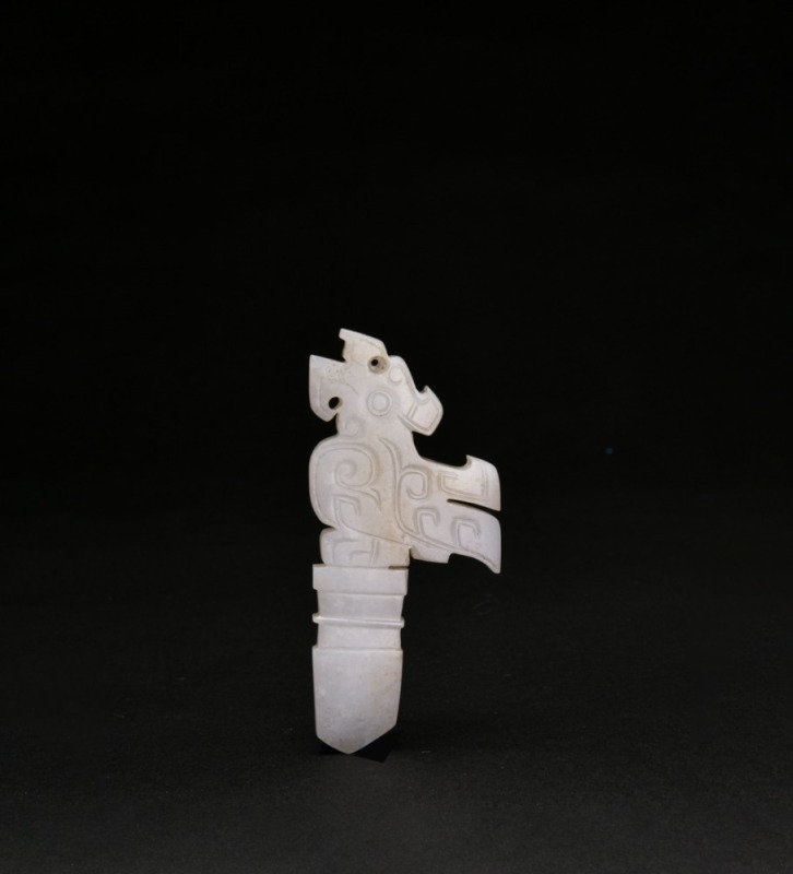 A Carved White Jade Mythical Beast-Form Ceremonial Pendant, Western Zhou Dynasty