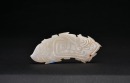 A Carved Jade Mythical Beast and Fish-Form Pendant, Western Zhou