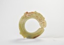 A Celadon And Russet Jade Dragon-Form Ring Pendant. Shang Dynasty - 2