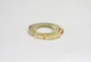 A Celadon And Russet Jade Dragon-Form Ring Pendant. Shang Dynasty - 4