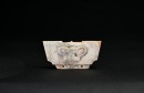 A Rare Carved Jade Crown-Shaped Ornament with Anthropomorphic Mask, Liangzhu Culture