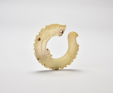 A White Jade Dragon-Form Pendant, Shang Dynasty