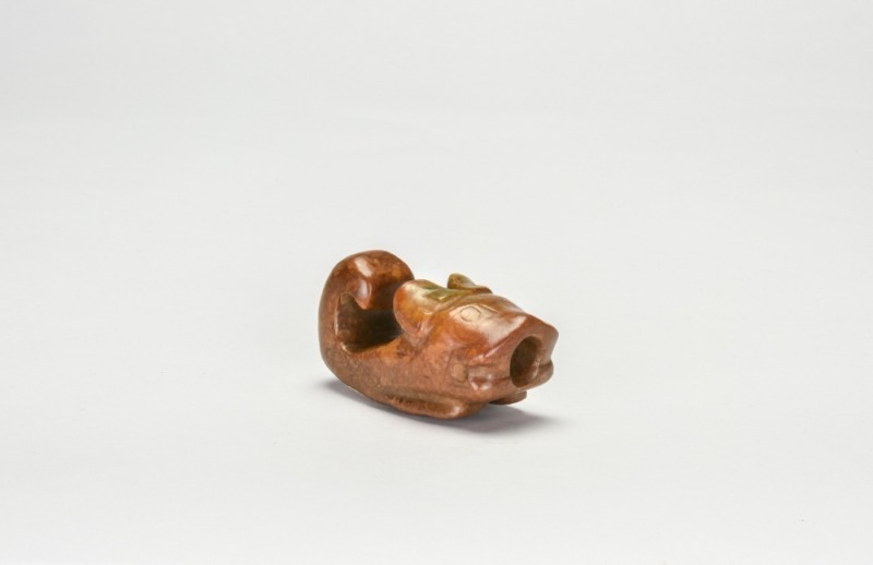 A Brown Jade Hook-Shaped Dragon Pendant, Shang Dynasty