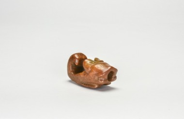 A Brown Jade Hook-Shaped Dragon Pendant, Shang Dynasty