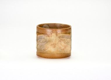 A Carved Jade Cong-Form Ritual Object with Anthropomorphic Mask Designs, Shang Dynasty