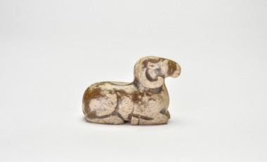 A Carved Jade Figure of a Recumbent Ram, Han Dynasty