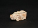 A Carved Jade Four-Tube Mythical Beast Fitting, Shang Dynasty