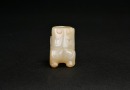 A Pale Celadon Jade Carving of a Recumbent Mythical Beast, Shang Dynasty - 9