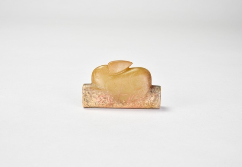 A Carved Jade Recumbent Hare-Form Fitting, Western Zhou Dynasty