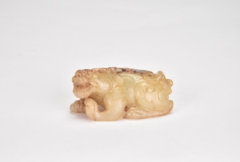 A Carved Jade Recumbent Mythical Beast, Han Dynasty