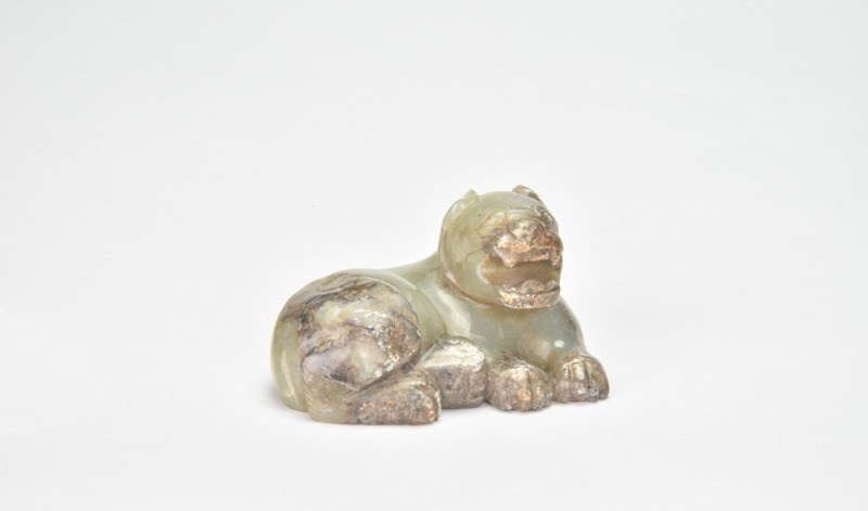 A Carved Jade Recumbent Tiger, Han Dynasty