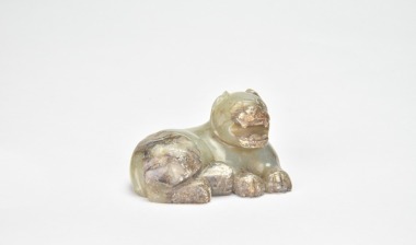 A Carved Jade Recumbent Tiger, Han Dynasty