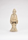 A Large Carved Jade Figure of a Kneeling Attendant, Han