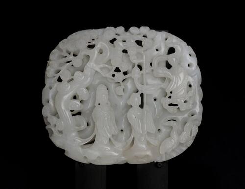 A White Jade Circular Plaque Carved Lady And Attendant