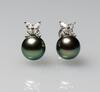 A Pair Of Black Pearl Earrings