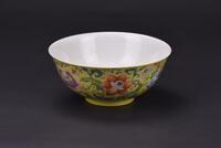 Qing - A Yellow Ground Famille-Glazed “Flowers” Bowl