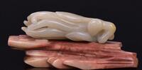 Qing - A White Jade Carved ‘Buddha Hand’ With Soapstone Stand