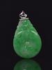 A Jadeite Carved Gold-Coin Pendant