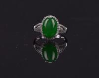 A Glassy Emerald Green Jadeite And Diamond Lady’s Ring