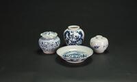 A Group Of Four Blue And White Jugs And Dish