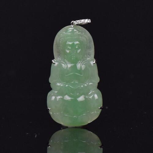 A Semi Translucent Jadeite Carved Guan Yin Pendant