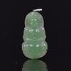 A Semi Translucent Jadeite Carved Guan Yin Pendant