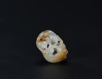 Qing - A Russet White Jade Carved Fox Toggle