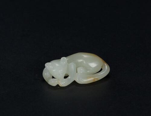 Qing - A Russet White Jade Carved Fox Toggle