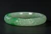 A Semi Translucent Apple Green Jadeite Carved ‘Dragon And Phoenix’ Bangle - 5