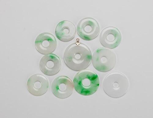 Republic-A Group Of 11 Jadeite Circular Pendants