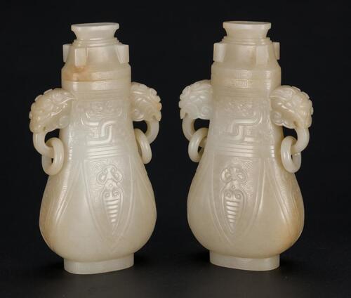 A Pair Of White Jade Carved Vases With Cover