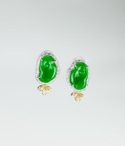 A Beautiful Carved Bright Green Jadeite Designer Earing