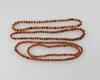 A Four Reddish Jadeite Beads Necklace