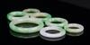 A Group Of Seven Jadeite Circle Pendants - 7