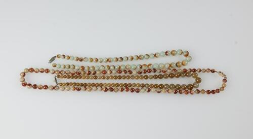 A Three Reddish Jadeite Beads Necklace