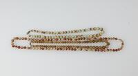 A Three Reddish Jadeite Beads Necklace