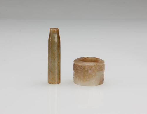 Qing- A russet White Jade Archer Ring And Cigarette Holder