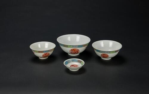 A Group Of Four Famille Glaze Dragon And Phoenix Bowl