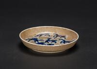 A Dark Yellow Ground Crackle-Glazed Blue And White Eight Horses Dish