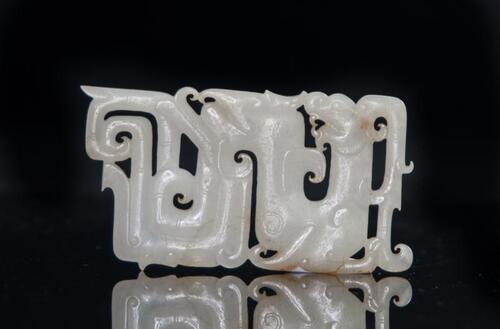 Han- A White Jade Carved Dragon Pendant