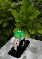 A Stunning vivid apple green Jadeite Jade diamond ring