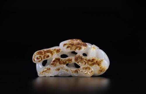 Qing - A Russet White Jade Carved Lingzhi Pendant