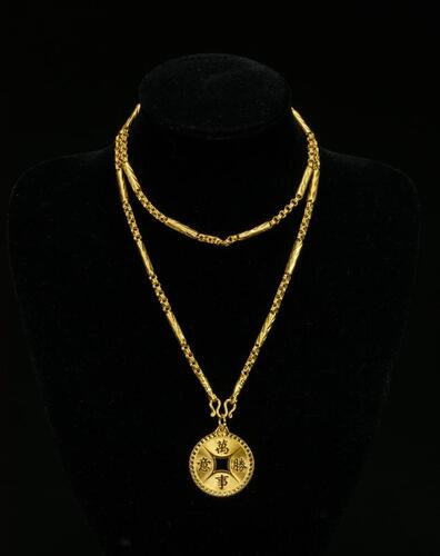 A 24k Glod Necklace and Gold Pendant