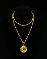 A 24k Glod Necklace and Gold Pendant