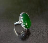 A Translucent Green Jadeite Ring Mount with Diamond And White Gold