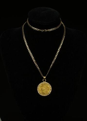 A 1984 Panda 1/4 oz Gold Coin Pendant mounted and with 14k Gold Necklace