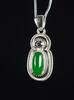 Bright imperial green Jadeite Jade cabochon in pendent setting
