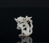 Liao-A White Jade Carved Dragon Pendant