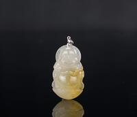 A Translucent Yellow Jadeite Carved Maitreya Pendant