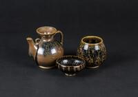 A Jianyao Teapot And Two Bowl